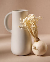 handmade, artisan made, jug, matte white, pitcher, bottle, blanc mat, matte finish, serveware, drinkware, pichet, bouteille, carafe, blanc mat, artisan made fait à la main, arisanal, intemporel, design, dadasi, gharyan stoneware, ethically made, ethique, fair trade, commerce équitable